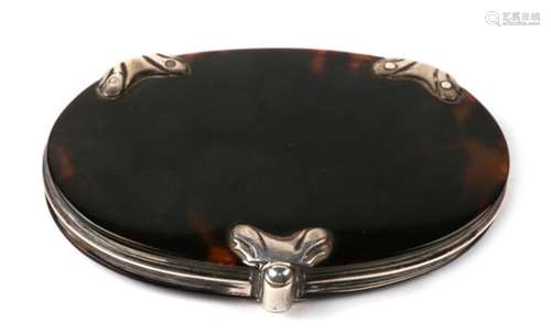 A Georgian oval unmarked (tested) silver mounted tortoiseshell swivel eyeglass, 7.5cm (3 ins) wide