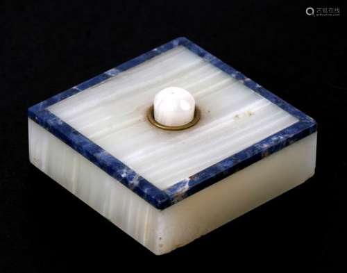 An Art Deco white onyx bell push, edged with lapis lazuli. 5.7cm (2.25 ins) wide