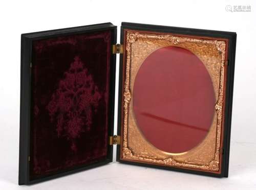 A large mid 19th century Union case for a photographic image, the front decorated in high relief