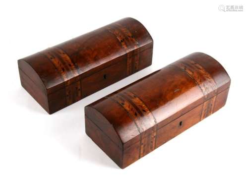 A pair of Victorian dome top Tunbridge ware banded pencil boxes, 25cms (9.75ins) wide (2).