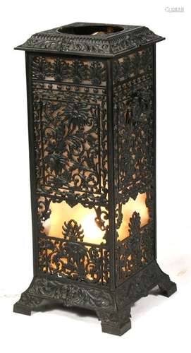 A Victorian pierced cast iron stove (converted to a lamp), 69cm (27ins) high.