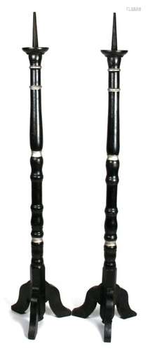 A pair of Gothic style painted wooden candlesticks on tripod base. 134cm (52.75 ins) high