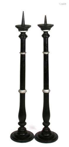 A pair of Gothic style painted wooden candlesticks. 98cm (38.5 ins) high