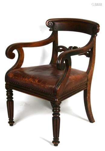 A 19th century mahogany desk chair with leather upholstered seat, on turned front supports.