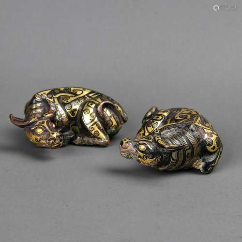 Pair of Parcel Gilt Buffalos