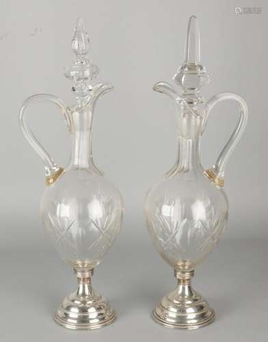 Two crystal decanters donate grinding, posted round