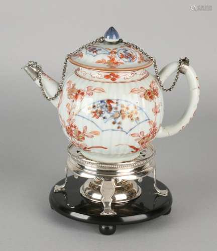 Chinese porcelain jug with silver elements on the lid,