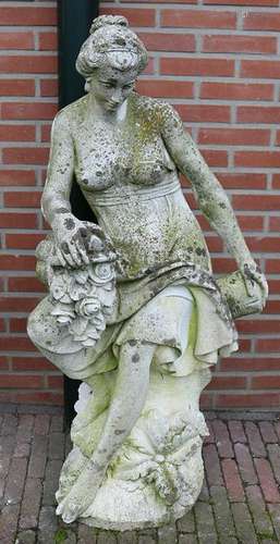 Big old cast cement sculpture garden. Woman with