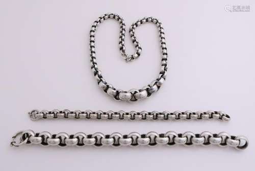 Lot with a silver necklace and two silver bracelets,