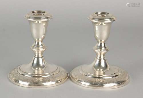 Two low silver candlesticks 925/000, on circular base