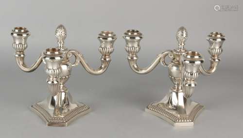 Two silver candlesticks 835/000, with three lights,