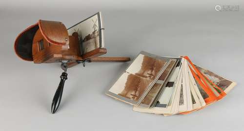 Antique stereo viewer with several pre-war maps. Size: