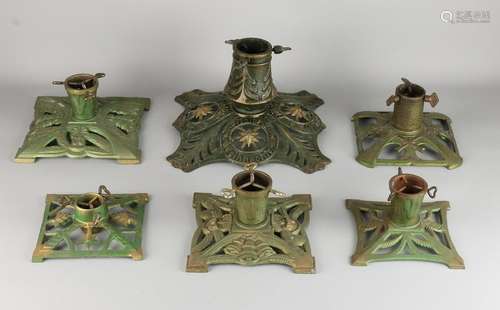 Six antique cast iron Christmas tree stands. 1900 -