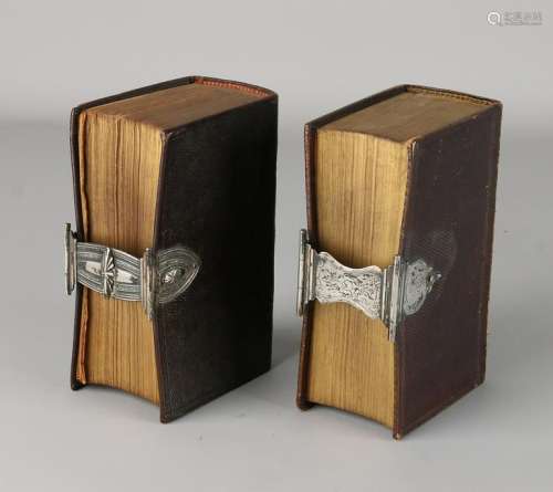 Two Bibles with silver clasp. Two bibles, The New