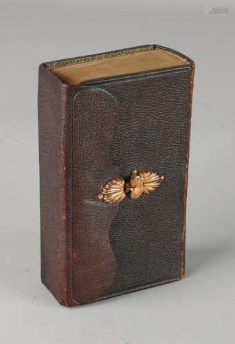Bible with golden lock, the New Testament, with brown