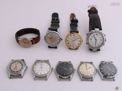 Lot 9 watches with steel or plated steel cabinets.