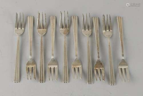 Twelve silver cake forks, 835/000, with a stem