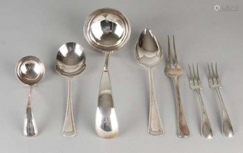 Lot silver cutlery, 833/000, a roll, a living soup,