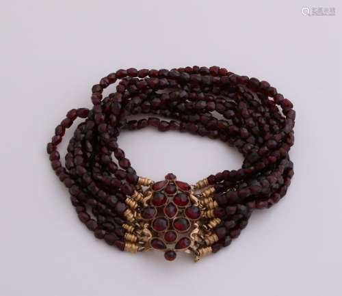 Bracelet with 9 rows garnet beads, ø3 mm, attached with