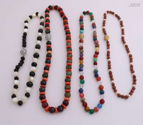 Four necklaces with precious stones, with, inter alia,