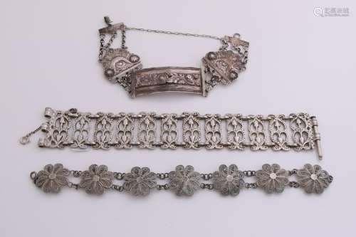 Lot with three silver bracelets, one made from an old