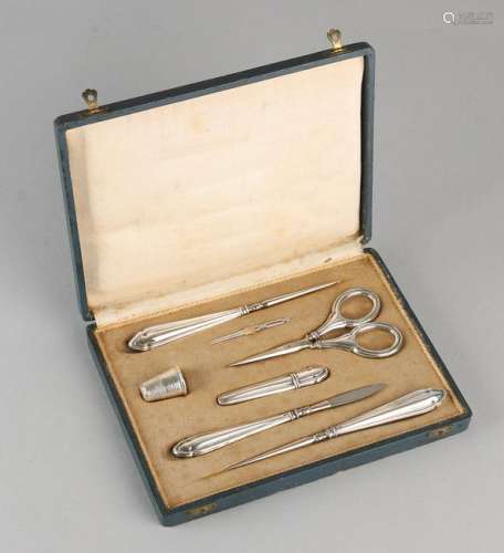 Seven-piece 800/000 silver sewing kit. Comprising: