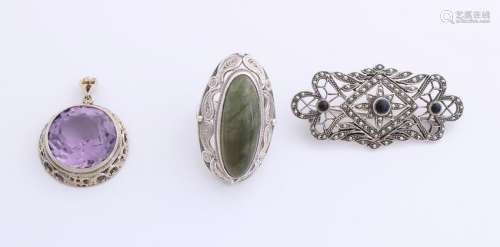 Three silver jewelry, round pendant with purple stone,