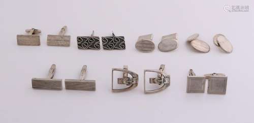 Seven pair of silver cufflinks, 835/000, with various