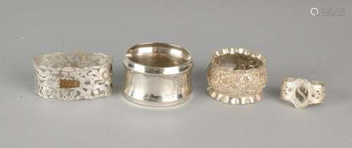 Lot four napkin bands, two silver round models with