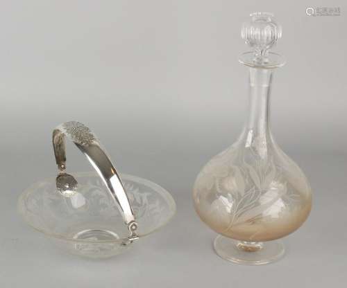 Two parts crystal with silver, a decanter and shell