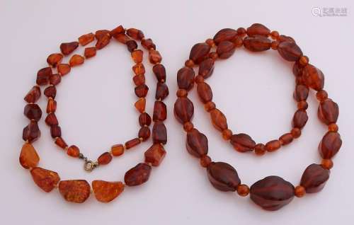 Two necklaces of amber, translucent beads with cut.