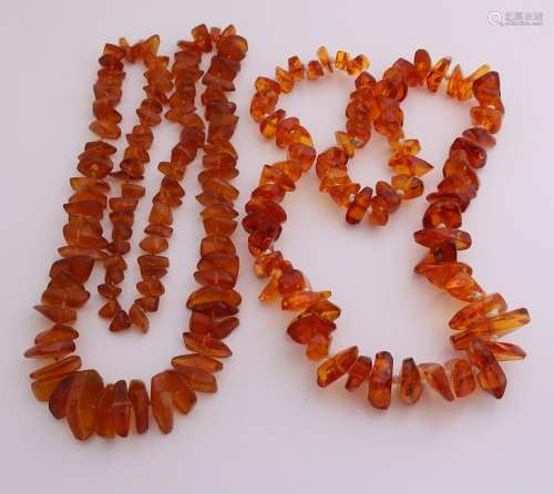 Two necklaces of amber, both running, tumbled with