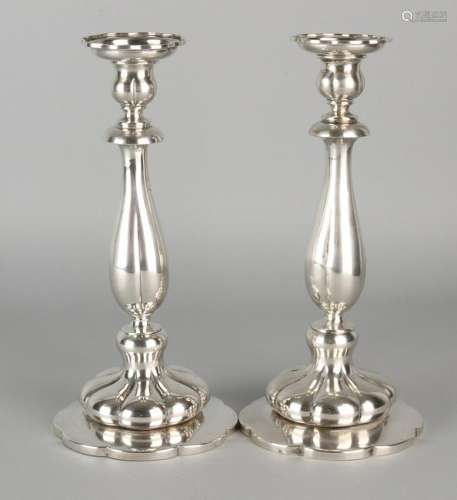 Pair of silver candlesticks 833/000, round molded base
