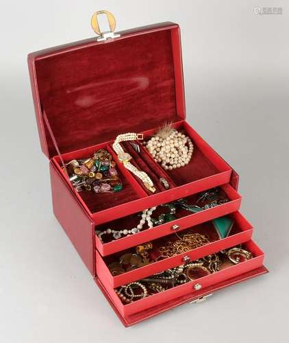 Jewelry box filled with assorted jewelry include