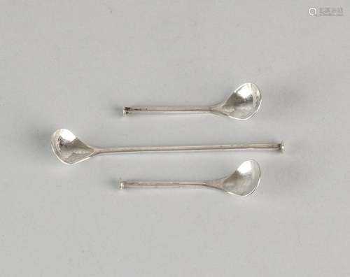 Two 835/000 silver salt spoons and matching 835/000