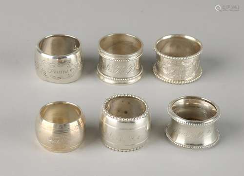 Lot six small napkin rings, five silver rings various