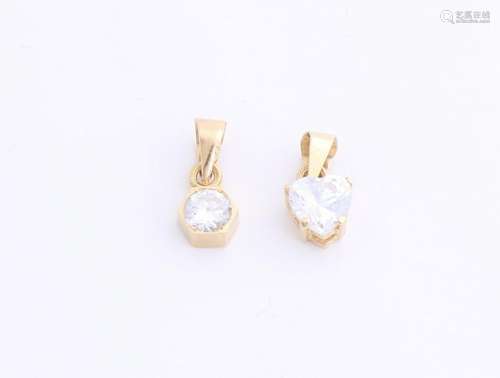 Two gold hangers, 585/000, with zirconia, a rounded cut