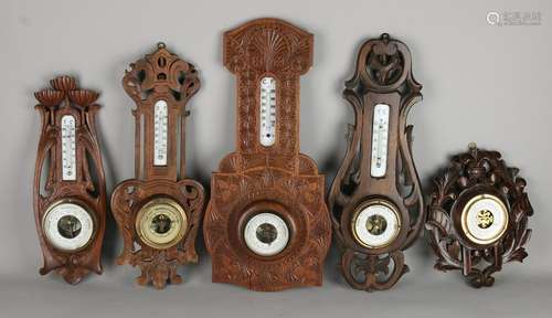 Five antique carved barometers. Circa 1910 - 1930.