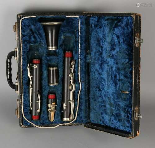 Antique rosewood clarinet in the original case.