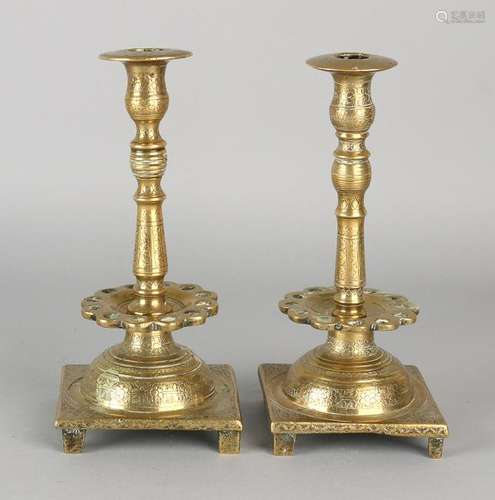 Two 18th century bronze engraved Oriental candle