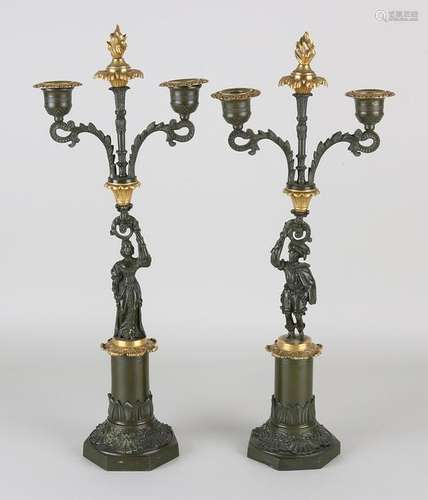 Two 19th century bronze two-light candle candlesticks