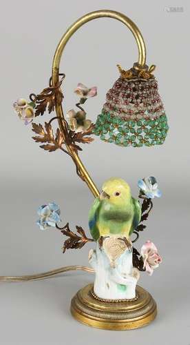 Antique gilded brass with porcelain parrot lamp. Circa