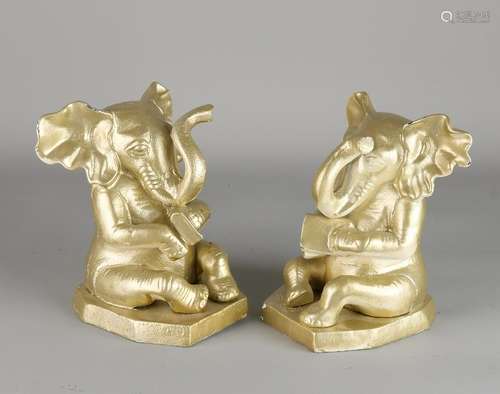 Two cast iron Art Deco bookends. Elephants. Circa 1930.