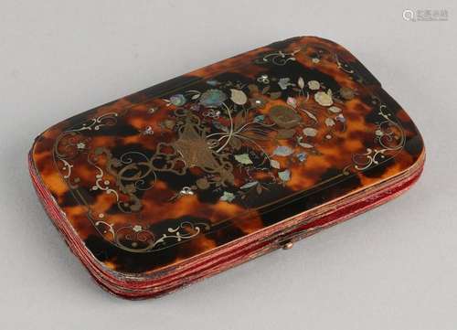 Case made from tortoise, rectangular shape with rounded