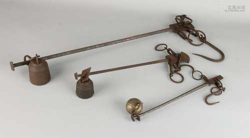 Three antique iron weighing as agents with