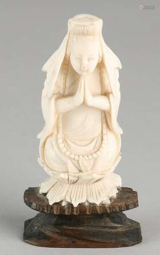 Antique Chinese ivory Quan Yin on lotus. Circa 1900.