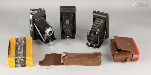 Three pre-war cameras holders. Kodak, Agfa and