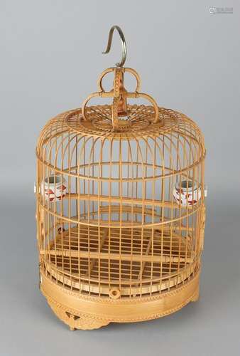 Chinese bamboo bird cage with porcelain holders. 21st