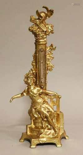 Figurative thermometer. Gold colored. Samac. Woman