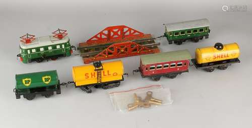 7-piece cans German Karl Bub toy train set. Circa 1950.